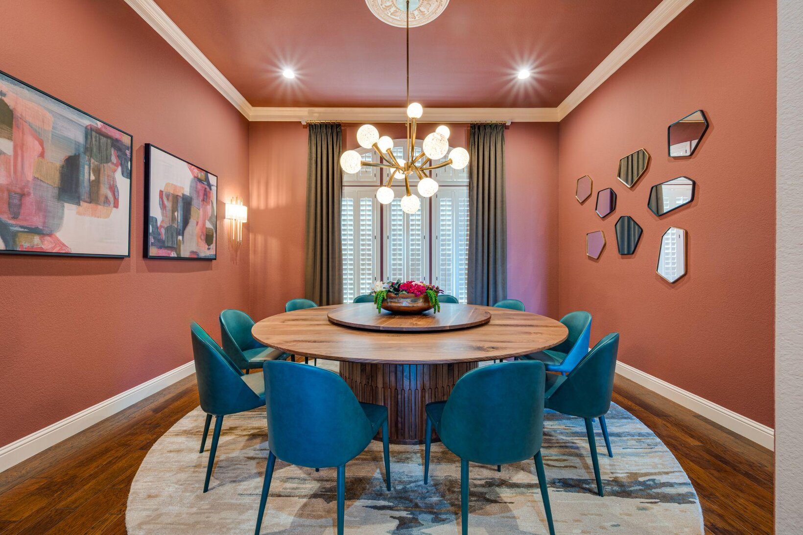 The Power of Ambient Lighting in Interior Design: Create a Cozy Atmosphere with Layered Lighting 3 Formal dining room with a statement globe chandelier and warm ambient lighting by Landry Designs