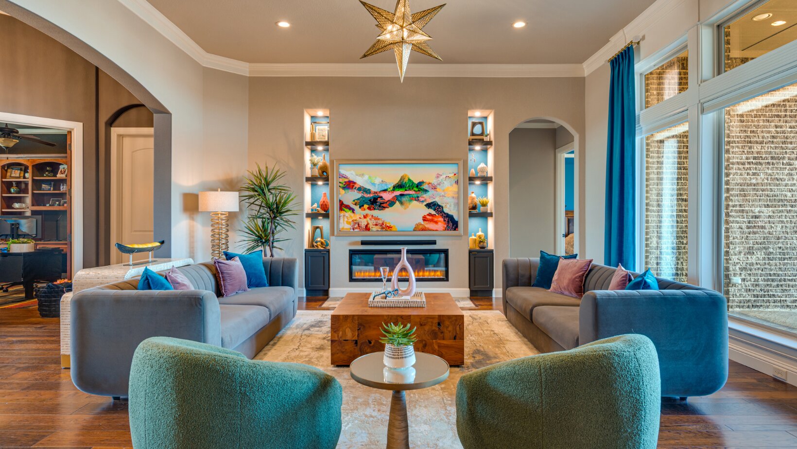The Power of Ambient Lighting in Interior Design: Create a Cozy Atmosphere with Layered Lighting 2 Living room with accent-lit built-in niches and a warm ambient glow by Landry Designs